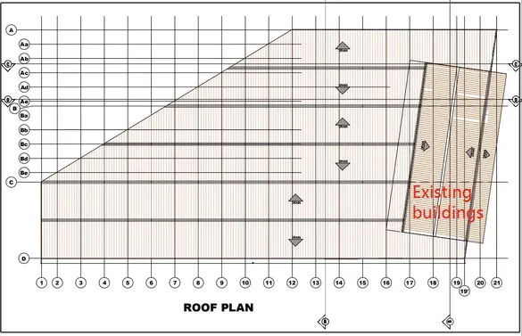 Edificio de fábrica con estructura de acero de forma irregular